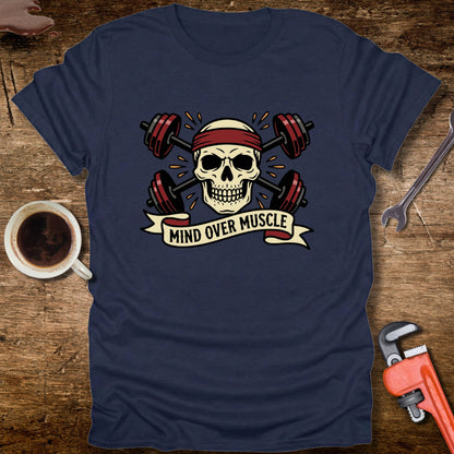 Navy blue t-shirt with skull and barbell design on a wooden surface with coffee and tools.