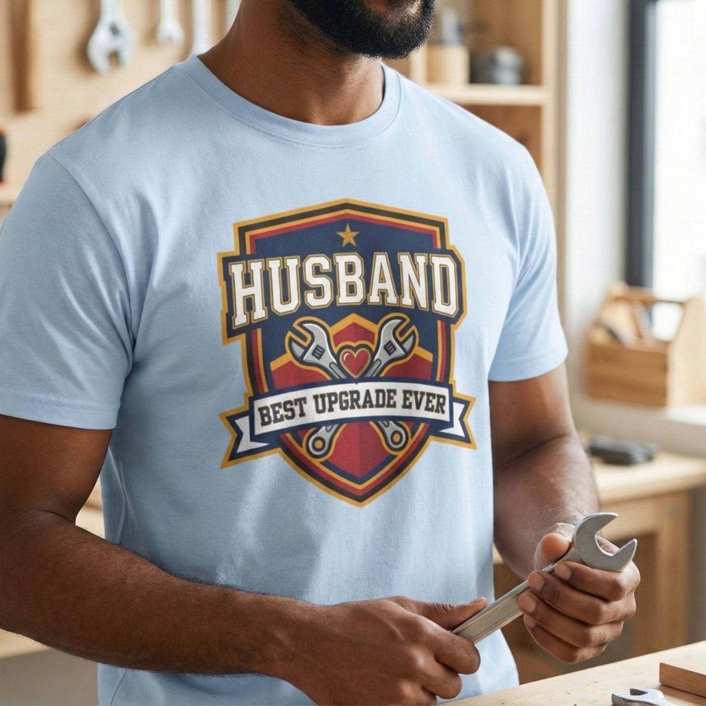 Person wearing a light blue t-shirt with 'Husband Best Upgrade Ever' graphic design.