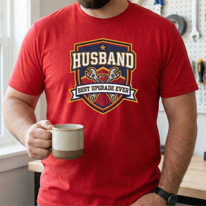 Person wearing a red t-shirt with 'Husband Best Upgrade Ever' design, holding a mug.