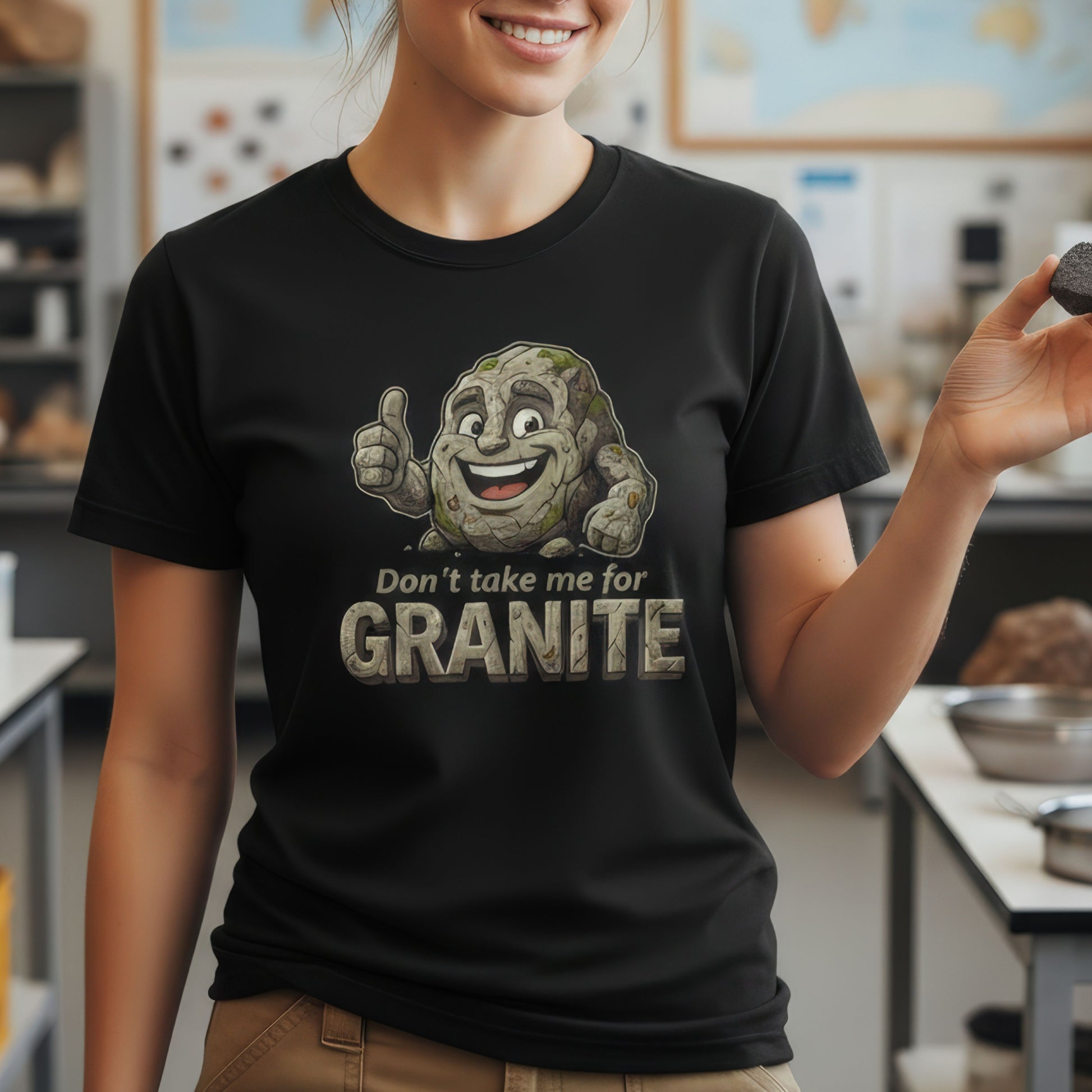 Person wearing a black t-shirt with a cartoon character and text in a classroom setting