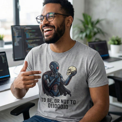 Man wearing a t-shirt with a robot and skull design in an office setting